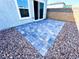 Newly installed patio with brick pavers and crushed gravel, accessible through sliding glass doors at 8694 Glen Echo Ave, Las Vegas, NV 89148