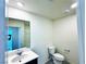 Bright and efficient bathroom with a single sink vanity and fixtures at 8694 Glen Echo Ave, Las Vegas, NV 89148