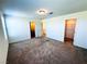 Inviting bedroom with plush carpeting, neutral walls, and en-suite bathroom and closet for added convenience at 8694 Glen Echo Ave, Las Vegas, NV 89148