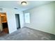 Comfortable carpeted bedroom with closet and natural light at 8694 Glen Echo Ave, Las Vegas, NV 89148