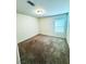 Bedroom features neutral carpet, bright lighting, and a sunlit window at 8694 Glen Echo Ave, Las Vegas, NV 89148