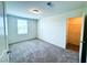 Clean bedroom featuring neutral walls, plush carpet, and a closet at 8694 Glen Echo Ave, Las Vegas, NV 89148