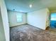 Bedroom features neutral walls, carpeted floors, closet, and natural light at 8694 Glen Echo Ave, Las Vegas, NV 89148