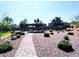 Inviting community area featuring a gazebo, picnic tables, and beautifully maintained landscaping at 8694 Glen Echo Ave, Las Vegas, NV 89148
