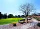 A tranquil community park offers a lush lawn, winding walkway, and relaxing bench seating at 8694 Glen Echo Ave, Las Vegas, NV 89148