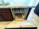 Interior view of a modern dishwasher with a clean, well-organized rack system at 8694 Glen Echo Ave, Las Vegas, NV 89148