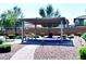 A relaxing gazebo with picnic tables offers a perfect spot for outdoor gatherings in the community at 8694 Glen Echo Ave, Las Vegas, NV 89148