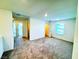 Well-lit upper hallway with plush carpeting and multiple doorways for convenient access to adjacent rooms at 8694 Glen Echo Ave, Las Vegas, NV 89148