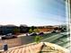 View of the neighborhood with well-maintained homes and parked cars at 8694 Glen Echo Ave, Las Vegas, NV 89148