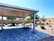 Backyard patio with brick pavers and a covered pergola at 8694 Glen Echo Ave, Las Vegas, NV 89148
