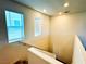 Bright staircase featuring modern design and a view of the windows at 8694 Glen Echo Ave, Las Vegas, NV 89148