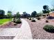 A charming community area features a paved walking path and serene green spaces at 8694 Glen Echo Ave, Las Vegas, NV 89148