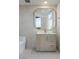 Modern bathroom with a stylish vanity, decorative mirror, and contemporary fixtures at 9101 Alta Dr # 207, Las Vegas, NV 89145