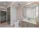 Contemporary bathroom with walk-in shower, sleek vanity, and modern fixtures at 9101 Alta Dr # 207, Las Vegas, NV 89145