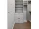 Custom walk-in closet with built-in shelves and drawers for ample storage space at 9101 Alta Dr # 207, Las Vegas, NV 89145