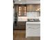Modern kitchen featuring custom cabinets, quartz countertops, and stainless steel appliances at 9101 Alta Dr # 207, Las Vegas, NV 89145