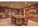 Gourmet kitchen with custom cabinetry, a large island, and professional-grade appliances at 9101 Alta Dr # 207, Las Vegas, NV 89145