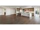 Bright and airy living space featuring an open layout, gourmet kitchen with top-of-the-line appliances, and wood flooring at 9101 Alta Dr # 207, Las Vegas, NV 89145