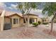 Cozy backyard featuring desert landscaping and a covered patio, perfect for outdoor relaxation at 9533 Yucca Blossom Dr, Las Vegas, NV 89134