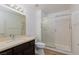 Bathroom featuring a single sink vanity and glass shower doors at 9533 Yucca Blossom Dr, Las Vegas, NV 89134