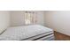 Bedroom featuring neutral carpet, a bed, and a bright window with shutters at 9533 Yucca Blossom Dr, Las Vegas, NV 89134