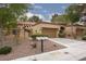 Charming single-story home with a well-manicured front yard and attached two-car garage at 9533 Yucca Blossom Dr, Las Vegas, NV 89134