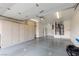 Spacious garage with ample storage cabinets and well-lit interiors at 9533 Yucca Blossom Dr, Las Vegas, NV 89134