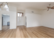Spacious living room with light wood floors, natural light, and high ceilings at 9533 Yucca Blossom Dr, Las Vegas, NV 89134