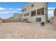 This backyard offers an open space enclosed by brick walls, ready for personalization at 9830 Wild Coyote Ct, Las Vegas, NV 89141