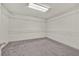 Walk-in closet with ample shelving and storage space at 9830 Wild Coyote Ct, Las Vegas, NV 89141