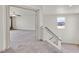 Hallway with soft carpet leading to a bedroom with white walls and natural lighting at 9830 Wild Coyote Ct, Las Vegas, NV 89141