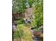 Backyard featuring a lemon tree and a trellis, providing a tranquil outdoor space at 1812 Ivanhoe Way, Las Vegas, NV 89102