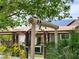 Stylish outdoor structure, wood posts, and neutral awning, offering a shaded retreat and enhancing outdoor living space at 1812 Ivanhoe Way, Las Vegas, NV 89102