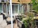 Outdoor patio with stylish seating area and a sliding glass door, perfect for relaxation and entertaining guests at 1812 Ivanhoe Way, Las Vegas, NV 89102