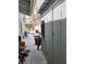 Side yard featuring storage shed, workspace, and tools at 1812 Ivanhoe Way, Las Vegas, NV 89102