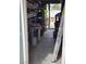 A look at the storage area showing shelves and stored equipment near an open entrance at 1812 Ivanhoe Way, Las Vegas, NV 89102