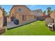 Low maintenance backyard with artificial turf and a patio perfect for relaxation or entertaining at 9614 Orchard Oasis Ct, Las Vegas, NV 89147