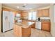 Well-equipped kitchen with granite countertops and stainless steel appliances at 9614 Orchard Oasis Ct, Las Vegas, NV 89147