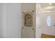 Foyer showcases a decorative arched niche set within an accent stone wall, complementing the home's entrance at 10513 Shanna Trellis Ave, Las Vegas, NV 89144