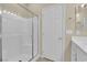 Clean bathroom with a glass-enclosed shower and tiled walls at 10973 Sardinia Sands Dr, Las Vegas, NV 89141