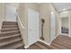Hallway featuring carpet stairs and luxury vinyl plank flooring at 10973 Sardinia Sands Dr, Las Vegas, NV 89141