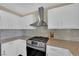Bright kitchen showcases white cabinets, granite countertops, and stainless steel appliances at 10973 Sardinia Sands Dr, Las Vegas, NV 89141