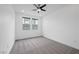 Relaxing bedroom has a ceiling fan, recessed lighting and neutral carpet at 11325 Gravitation Dr, Las Vegas, NV 89135