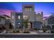 Beautiful three story home with modern design, large windows and a well maintained yard at 11325 Gravitation Dr, Las Vegas, NV 89135