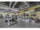 Well-equipped gym featuring treadmills, elliptical machines, and weightlifting equipment at 11325 Gravitation Dr, Las Vegas, NV 89135
