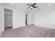 Spacious main bedroom with carpet, walk-in closet, and plenty of natural light at 11325 Gravitation Dr, Las Vegas, NV 89135