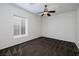 Neutral bedroom with carpet, ceiling fan, and window with shutters providing lots of natural light at 1342 Calle Calma, Henderson, NV 89012