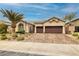 Charming home featuring a paver driveway and mature landscaping at 1342 Calle Calma, Henderson, NV 89012