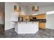 Bright kitchen featuring granite countertops, stainless appliances, and ample cabinet space at 1342 Calle Calma, Henderson, NV 89012