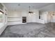 Open-concept living room with a fireplace and direct access to backyard at 1342 Calle Calma, Henderson, NV 89012